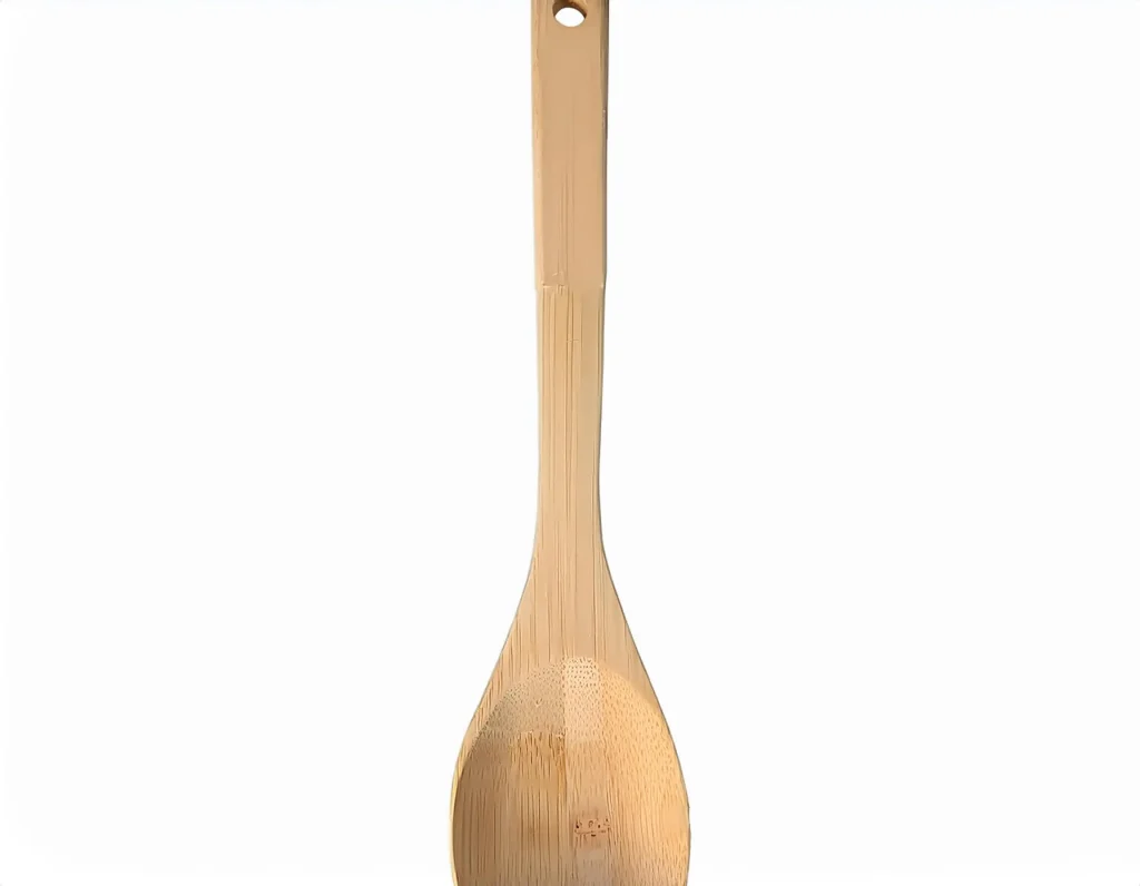 IKEA Rört Beech Spoon displayed on a kitchen countertop, highlighting its smooth finish and sturdy design.